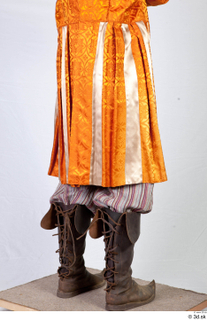  Photos Man in Historical Servant suit 2 Medieval clothing Medieval servant high leather shoes lower body orange skirt trousers 0006.jpg